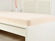 PrzytulneMieszkanie.pl Frotte prześcieradło do dziecięcego łóżeczka EXCLUSIVE 70x140 cm kremowe
