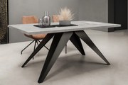 Designerski stół rozkładany na metalowej podstawie Vento