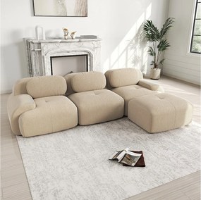 Beżowa sofa narożna - sofa 3-osobowa z zaokrąglonymi podłokietnikami i ozdobnymi poduszkami - sztruks