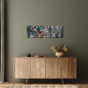 Obraz - Jeleń i łania w zaśnieżonym lesie (z zegarem) (90x30 cm)