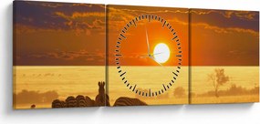 Obraz - Zebry z zachodem słońca (z zegarem) (90x30 cm)