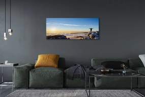Obraz canvas na ścianę Człowiek w Górach o Wschodzie