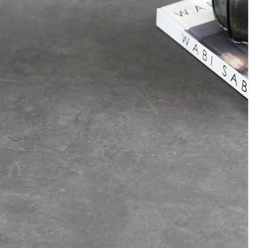 Elegancki stół z szarym ceramicznym blatem na hartowanym szkle. Metalowa podstawa z czarnej stali nadaje mu nowoczesny charakter i wyjątkową trwałość.