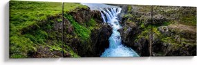 Obraz wodospadu między skałami (170x50 cm)