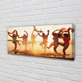 Obraz canvas na ścianę Ludzie nad Morzem o Zachodzie