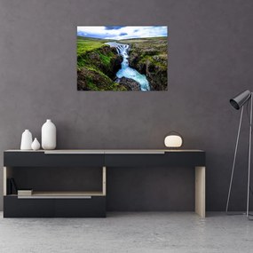 Obraz wodospadu między skałami (70x50 cm)