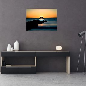 Obraz na szkle - szklane kule w dłoni (70x50 cm)