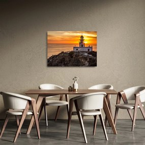 Obraz na szkle latarni morskiej o zachodzie słońca (70x50 cm)
