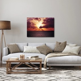Obraz słońca za chmurami (70x50 cm)