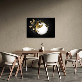 Obraz na szkle - Piłka ze złotymi motywami (70x50 cm)
