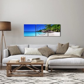 Obraz plaży na wyspie Praslin (z zegarem) (90x30 cm)
