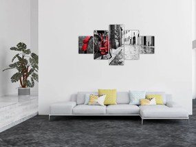 Obraz czerwonego roweru na brukowanej uliczce (125x70 cm)