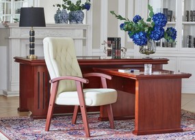 Eleganckie krzesło gabinetowe Consul tapicerowane skórą naturalną w kolorze brązowym, czarnym lub kremowym. Krzesło ma drewnianą ramę i podłokietniki, jest wygodne i solidnie wykonane.