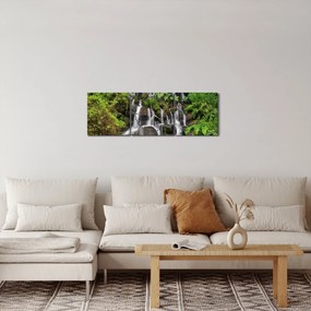 Obraz wodospadów w tropikalnym lesie (z zegarem) (90x30 cm)