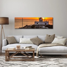 Obraz latarni morskiej o zachodzie słońca (170x50 cm)