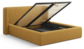 Musztardowe tapicerowane łóżko dwuosobowe ze schowkiem ze stelażem 180x200 cm Jason – Windsor &amp; Co Sofas