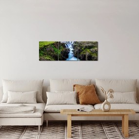 Obraz wodospadu między skałami (z zegarem) (90x30 cm)