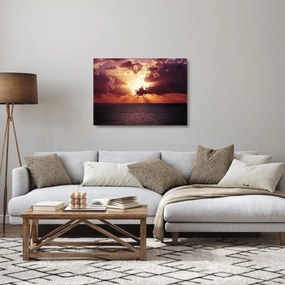 Obraz na szkle słońca za chmurami (70x50 cm)