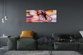 Obraz canvas na ścianę Rowerzysta w Blasku Świateł