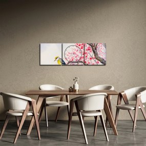 Obraz - ptak na drzewie z czerwonymi kwiatami (z zegarem) (90x30 cm)