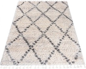 Kremowy dywan włochacz w stylu boho W8-G00