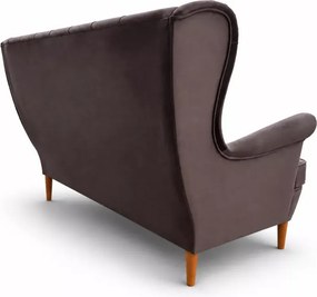 Nowoczesna sofa uszak z przeszyciami i pikowaniem po całości