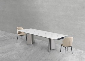 Nowoczesny stół rozkładany Nexus o wymiarach 200(280)×90 cm zachwyca eleganckim blatem z masy ceramicznej i solidną podstawą ze stali szczotkowanej. Styl, trwałość i funkcjonalność w jednym – idealny do jadalni i salonu.