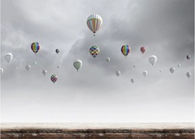Obraz - Balony nad ceglaną ścianą (70x50 cm)