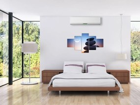Obraz ułożonych kamieni jeden na drugim (125x70 cm)