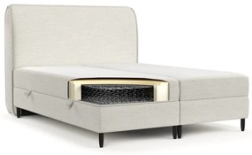 Kremowe łóżko boxspring ze schowkiem 200x200 cm Melba – Maison de Rêve