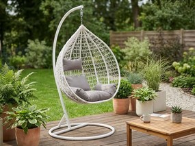 Białe wiszące krzesło KOKON ze stojakiem, jasna poduszka