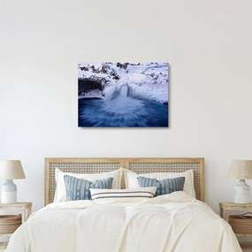 Obraz na szkle wodospadu zimą (70x50 cm)