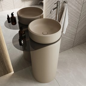 Umywalka z konglomeratu wolnostojąca okrągła z półką szklaną 85 x 40 cm RONA bez przelewu | Różne kolory półki : Kolor szkła - Grafitowy, Kolor umywalki RONA - Beż połysk, Podłączenie syfonu - Do ściany, Półka - Szklana