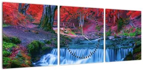 Obraz wodospadu w czerwonym lesie (z zegarem) (90x30 cm)