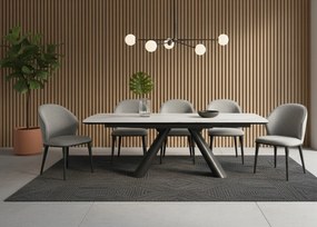 Elegancki stół z białym ceramicznym blatem na hartowanym szkle. Metalowa podstawa z czarnej stali nadaje mu nowoczesny charakter i wyjątkową trwałość.