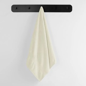Kremowy bawełniany ręcznik frotte 30x50 cm Marina – DecoKing