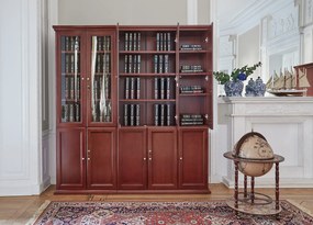 Szafa gabinetowa 3-drzwiowa z górnymi drzwiami częściowo przeszklonymi. Dolne drzwi są pełne. Wymiary 120x40x220 cm. Szafa jest fornirowana, ma widoczne usłojenie, fronty są wykończone płyciną.