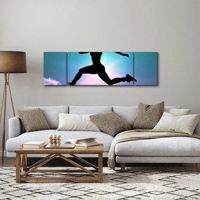 Obraz skaczącej sylwetki kobiety (170x50 cm)
