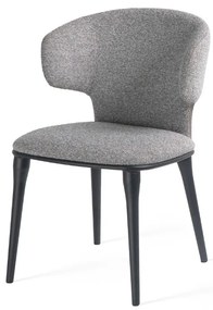 Stylowe krzesło Serene, które łączy miękką tkaninę  z wygodą i solidnym wykonaniem, idealne do wnętrz z charakterem.