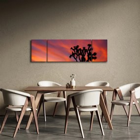 Obraz zachodu słońca nad sylwetką drzewa (170x50 cm)