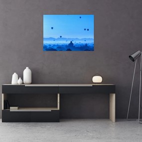 Obraz na szkle - Balony nad krajobrazem (70x50 cm)
