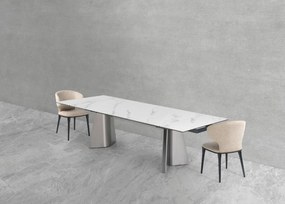 Nowoczesny stół rozkładany Nexus o wymiarach 200(280)×90 cm zachwyca eleganckim blatem z masy ceramicznej i solidną podstawą ze stali szczotkowanej. Styl, trwałość i funkcjonalność w jednym – idealny do jadalni i salonu.