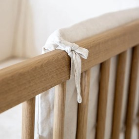 Łóżeczko z litego drewna dębowego z regulowaną wysokością 60x120 cm w naturalnym kolorze Forrest – Vipack