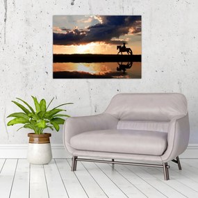 Obraz na szkle - Jeździec na koniu o zachodzie słońca (70x50 cm)