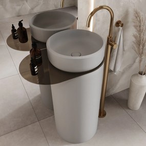 Umywalka z konglomeratu wolnostojąca okrągła z półką szklaną 85 x 40 cm RONA bez przelewu | Różne kolory półki : Kolor szkła - Brązowy, Kolor umywalki RONA - Szary połysk, Podłączenie syfonu - Do ściany, Półka - Szklana