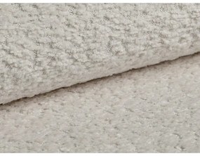 Beżowa poduszka na sofę z materiału bouclé Kemi – Cosmopolitan Design