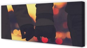 Zdjęcie na płótnie Dłonie w Blasku Świateł