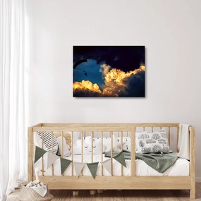 Obraz na szkle skoczka spadochronowego w chmurach (70x50 cm)