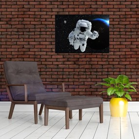 Obraz na szkle - Astronauta w kosmosie (70x50 cm)