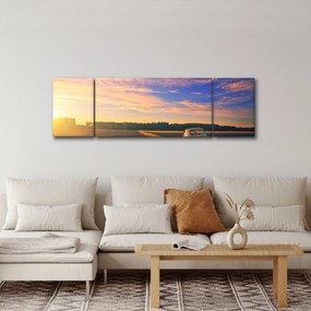 Obraz żółtego samochodu na polu (170x50 cm)